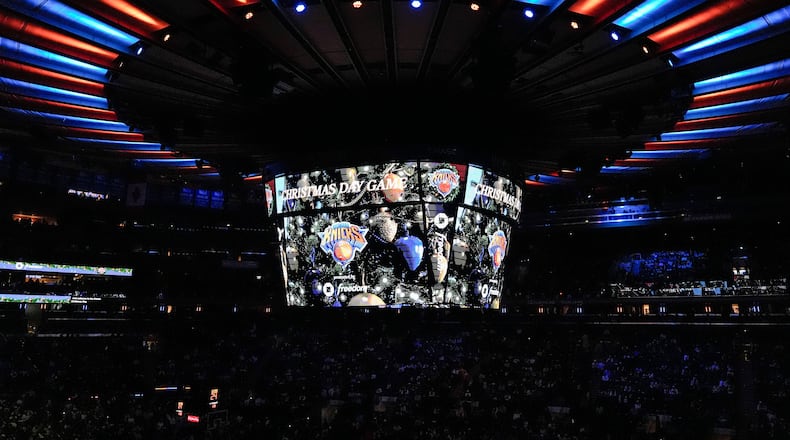 A screen displays "Christmas Day Game" before an NBA basketball game between the New York Knicks and the Cleveland Cavaliers, Thursday, Dec. 25, 2025, in New York. (AP Photo/Yuki Iwamura)