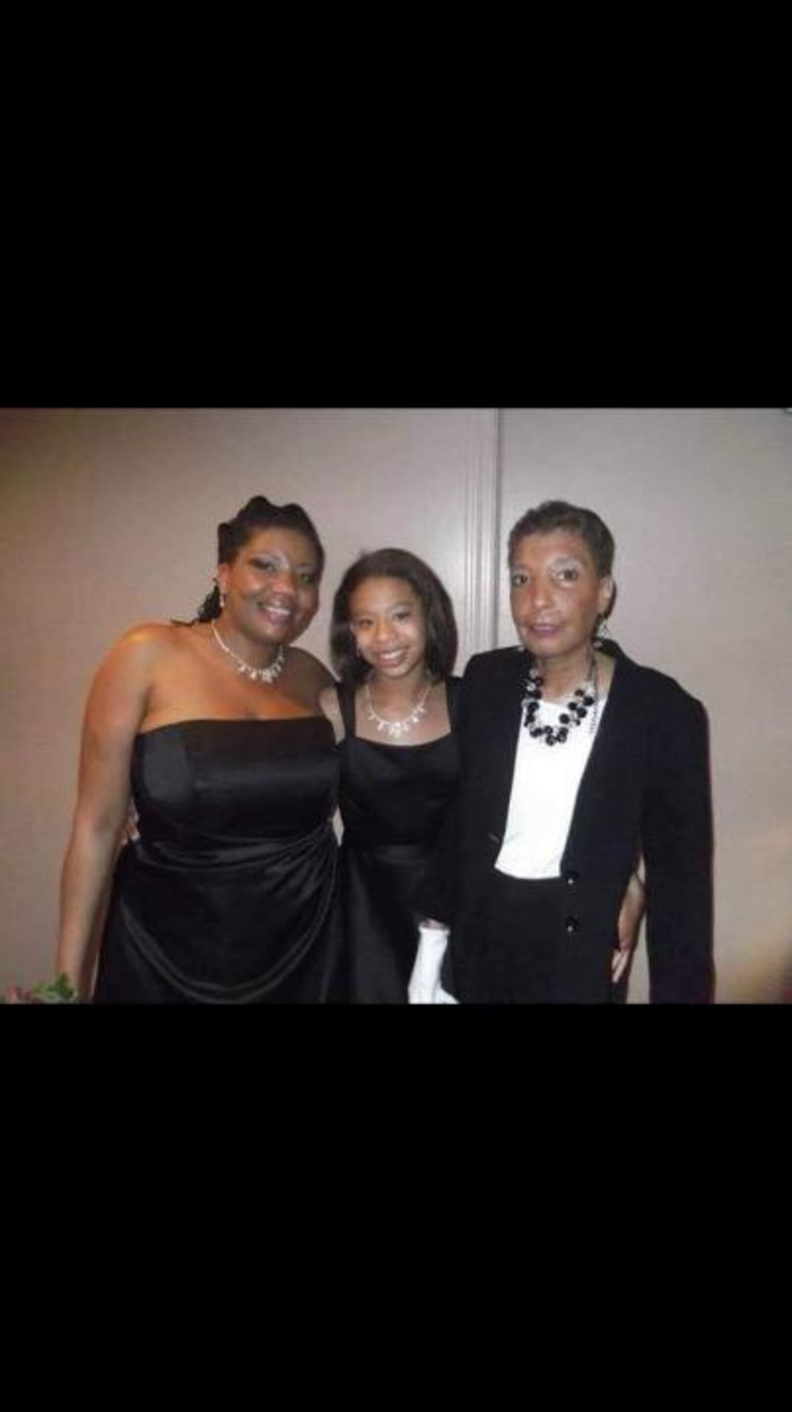 Rikki Harris flanked by her mom, Brittney Whitley, (left) and her grandmother Theresa Jones at a 2012 wedding. CONTRIBUTED