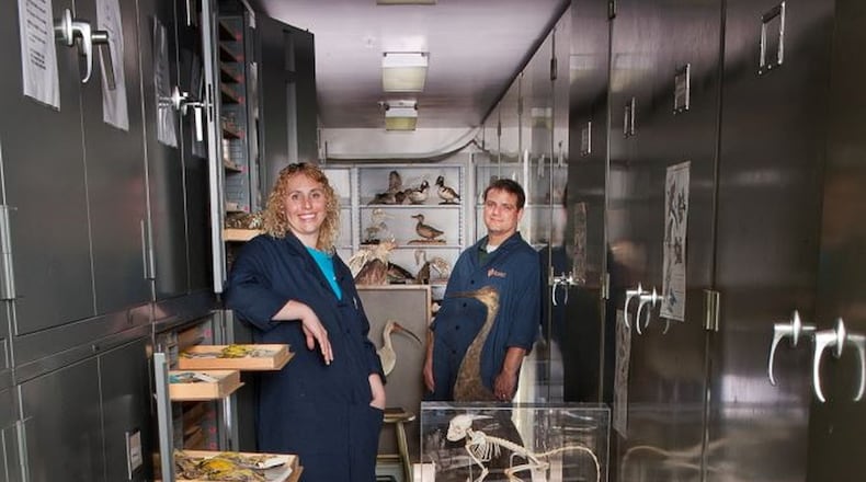 Curators Jill Krieg-Accrocco and Bill Kennedy in the collections vault. CONTRIBUTED