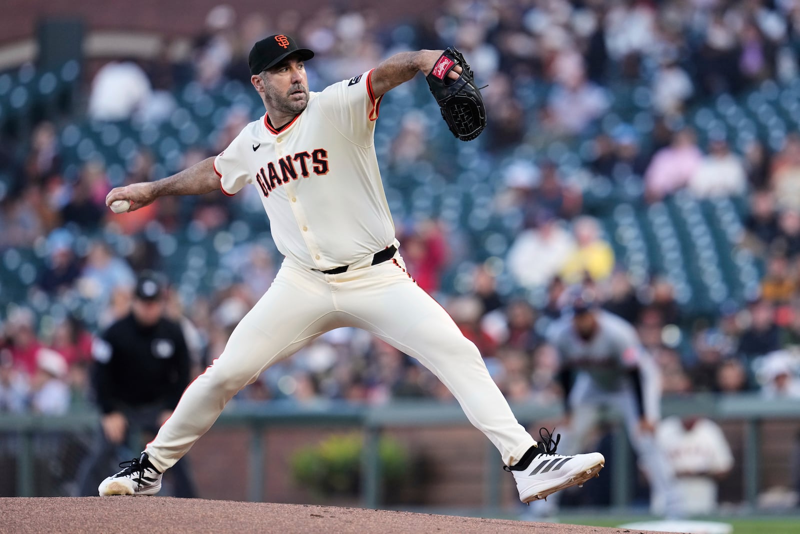 San Francisco Giants pitcher Justin Verlander throws to a Cleveland Guardians batter during the first inning of a baseball game Wednesday, June 18, 2025, in San Francisco. (AP Photo/Godofredo A. Vásquez)