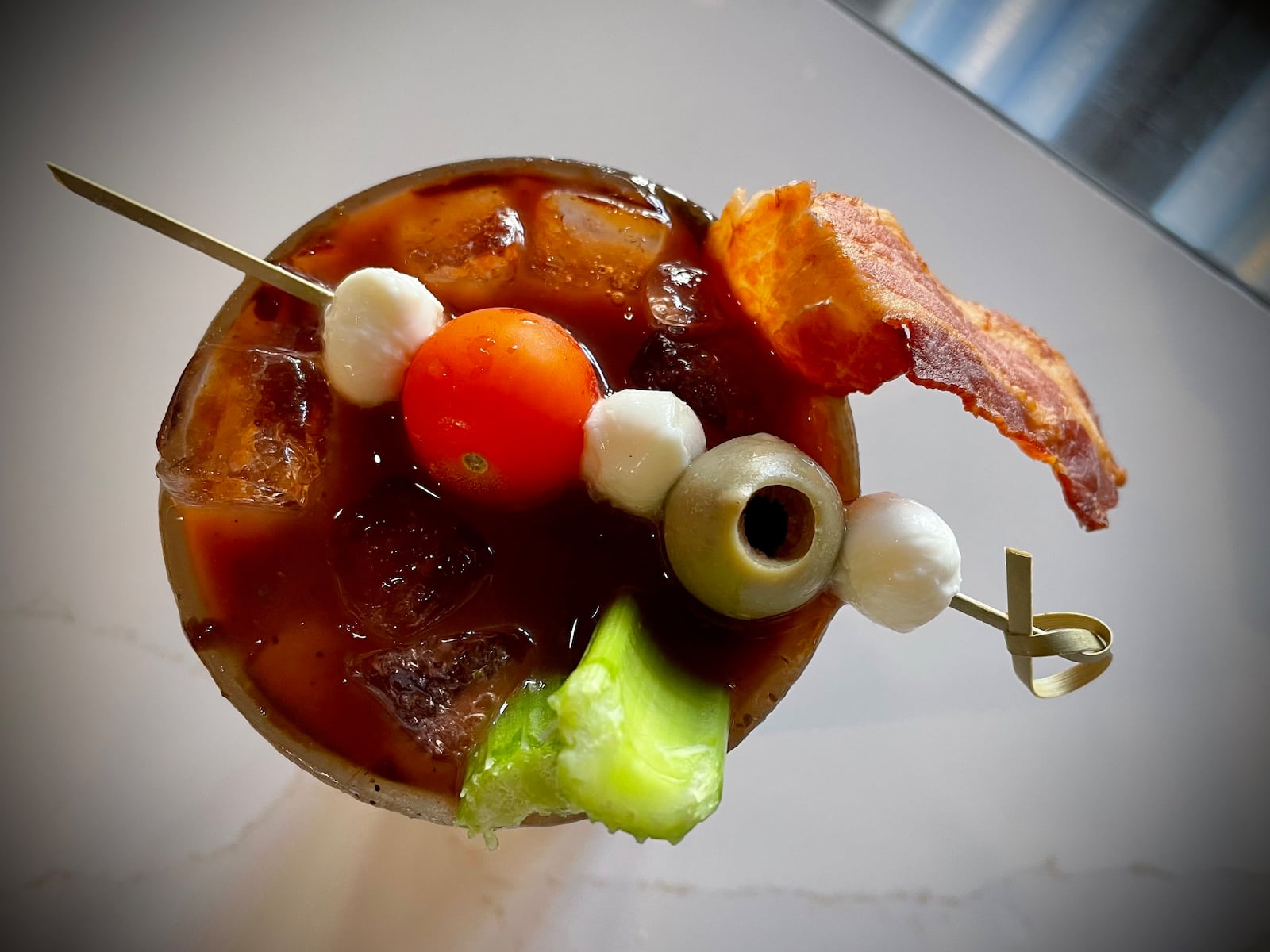 The Garden Grille & Bar is located on the second floor of the Hilton Garden Inn Dayton Downtown at 18 W. Third St. Pictured is the Bacon Balsamic Bloody Mary. NATALIE JONES/STAFF