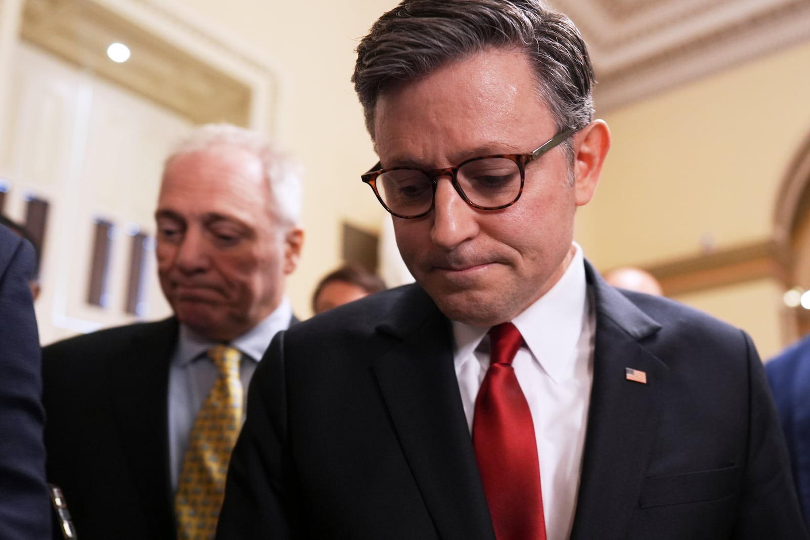 Speaker of the House Mike Johnson, R-La., with House Majority Leader Steve Scalise, R-La., left, walks to the chamber, at the Capitol in Washington, Wednesday, July 2, 2025. (AP Photo/J. Scott Applewhite)