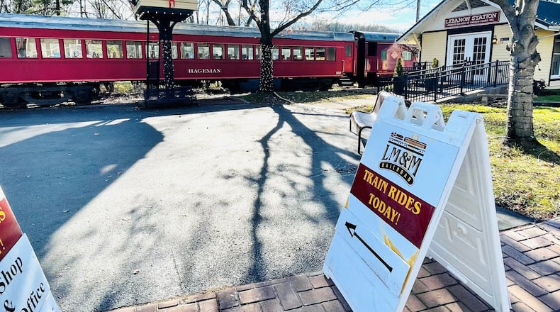 Tens of thousands of people watched the annual horse-drawn carriage parade and festival in downtown Lebanon, Ohio on Sat., Dec. 4, 2021. The LM&M Railroad was empty of passengers while the parade occurred. FILE PHOTO
