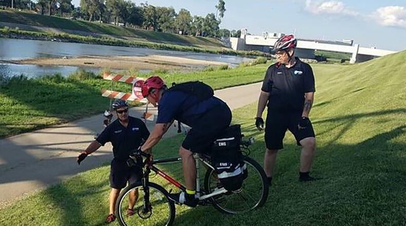 Tim Howells, Benjamin Cully and Adam Megnin participate in an International Police Mountain Bike Association course. Wright-Patterson Air Force Base’s Emergency Medical Service bike team requires all members to be trained and certified before they can participate. They must take and pass the IPMBA course, which teaches bike maneuverability on all terrains and around crowds. (Courtesy photo)