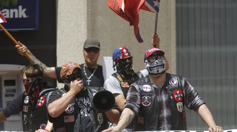 The Honorable Sacred Knights, an Indiana-based group affiliated with the Ku Klux Klan, brought nine members to Courthouse Square in May 2019. Security costs for the event ran a combined $770,000 for the city of Dayton and Montgomery County. CHRIS STEWART / STAFF