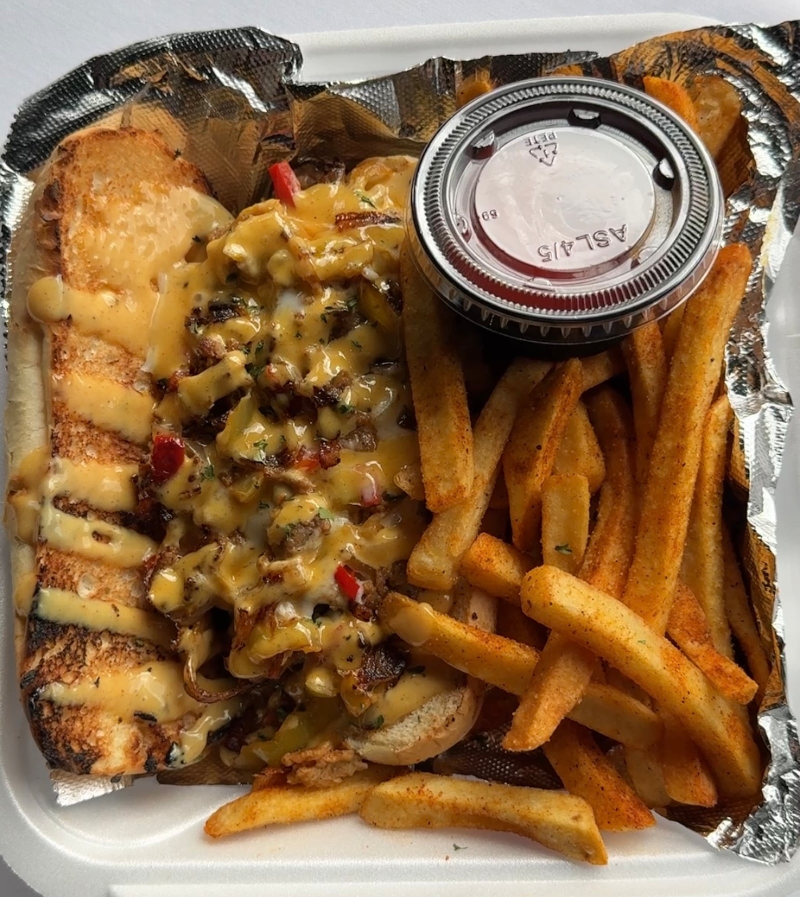 The Philly Cheesesteak is a popular to-go item at Morgan's in Dayton. CONTRIBUTED