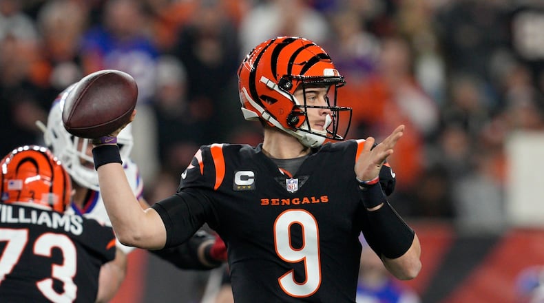 Cincinnati Bengals quarterback Joe Burrow (9) throws during the first half of an NFL football game against the Buffalo Bills, Monday, Jan. 2, 2023, in Cincinnati. (AP Photo/Jeff Dean)