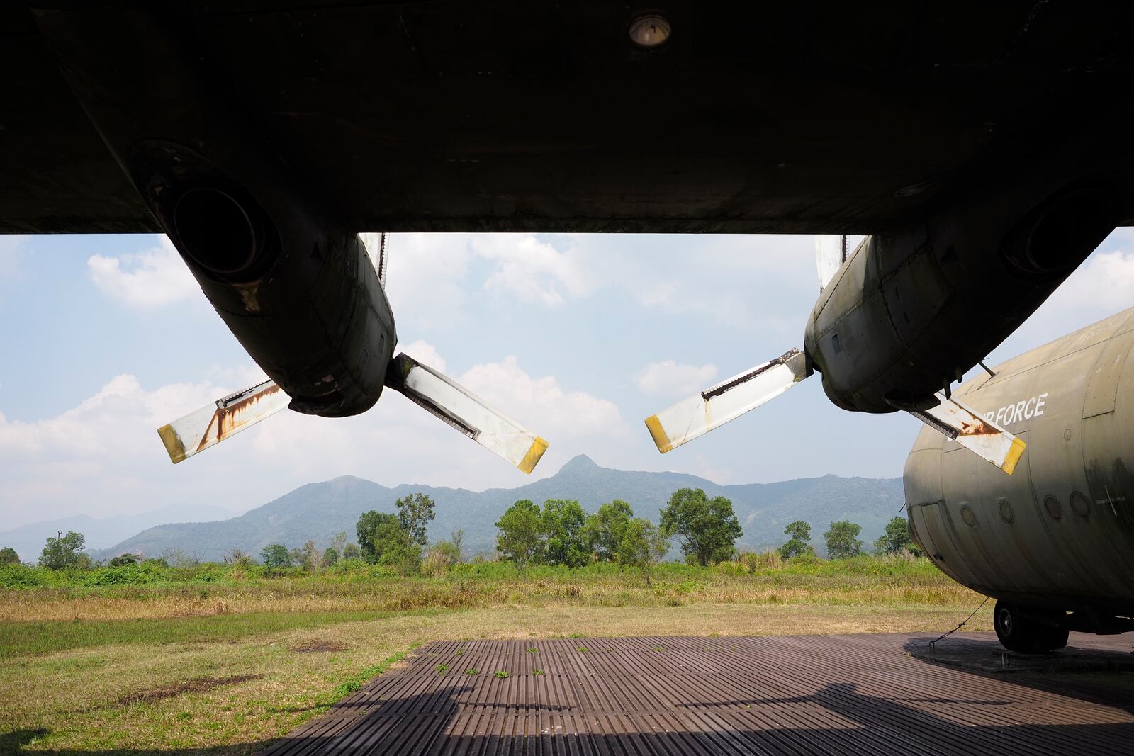 An American transport aircraft stands at the edge of the runway at the Khe Sanh Combat Base in Vietnam. Feb. 22, 2024. (AP Photo/David Rising)