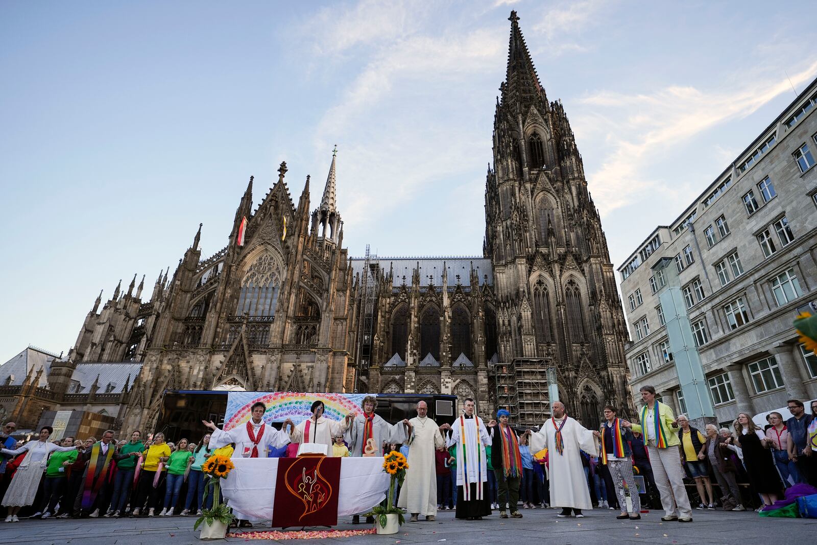 FILE - A public blessing ceremony with hundreds of believers takes place in front of the Cologne Cathedral in Cologne, Germany, Sept. 20, 2023. (AP Photo/Martin Meissner, File)