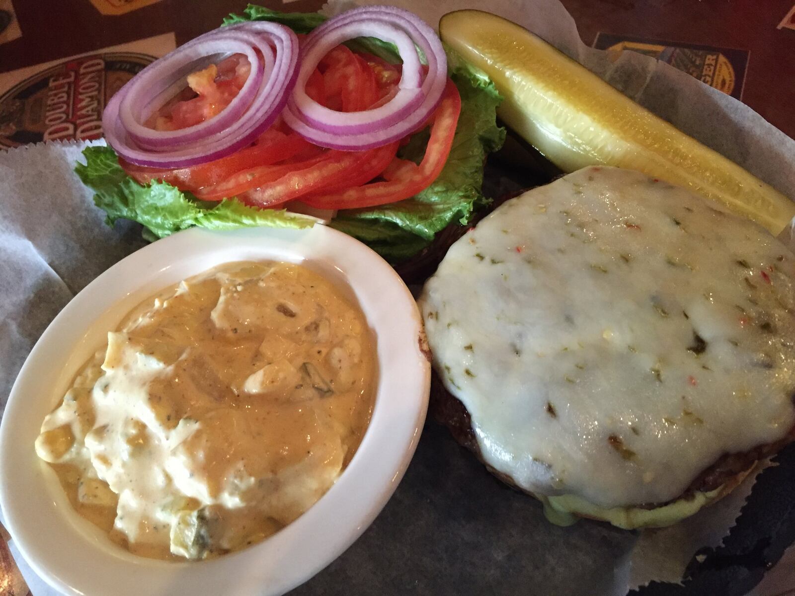 The Island Delight burger from Blind Bob’s a half-pound patty, stuffed with sweet pineapple and zippy pepper-jack cheese, with a teriyaki glaze, more cheese and served with a tangy wasabi-mayonnaise. CONTRIBUTED PHOTO BY ALEXIS LARSEN