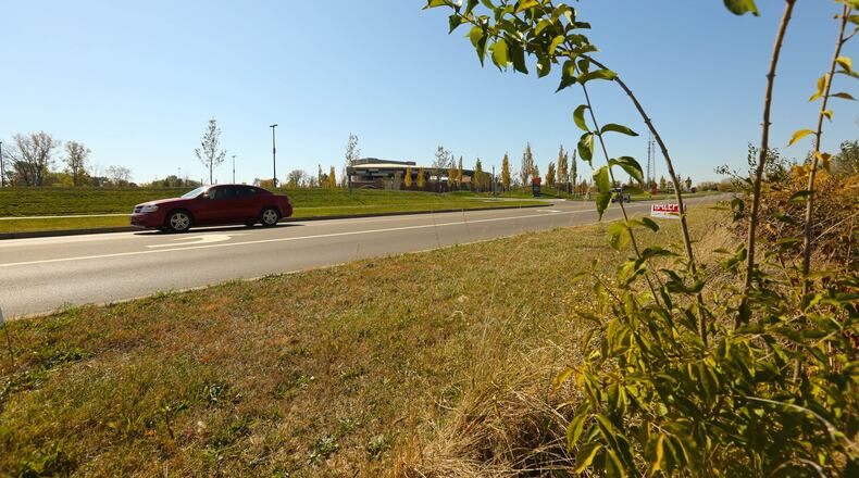 Land across the street from Rose Music Center in Huber Heights, seen in a 2015 file photo, remains undeveloped. FILE/STAFF