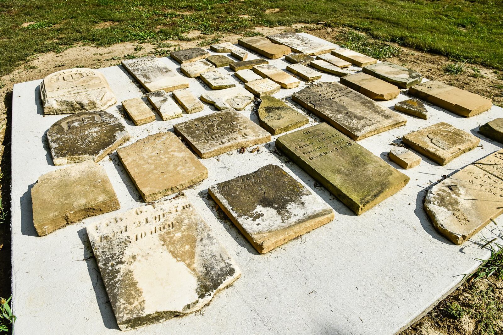 C.J. Castle built a 12-foot by 12-foot concrete slab that serves as a final resting place for about 40 headstones that either were misplaced or severely damaged.
