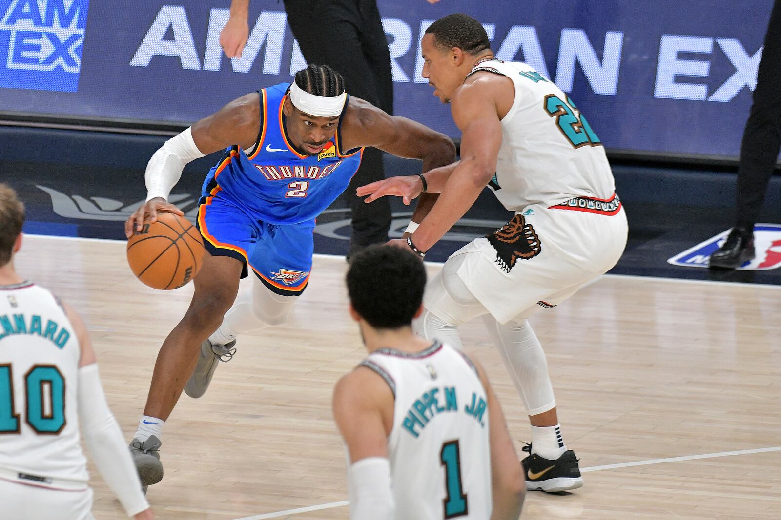 Oklahoma City Thunder guard Shai Gilgeous-Alexander (2) handles the ball against Memphis Grizzlies guard Desmond Bane (22) in the second half of Game 3 of an NBA first-round playoff series Thursday, April 24, 2025, in Memphis, Tenn. (AP Photo/Brandon Dill)