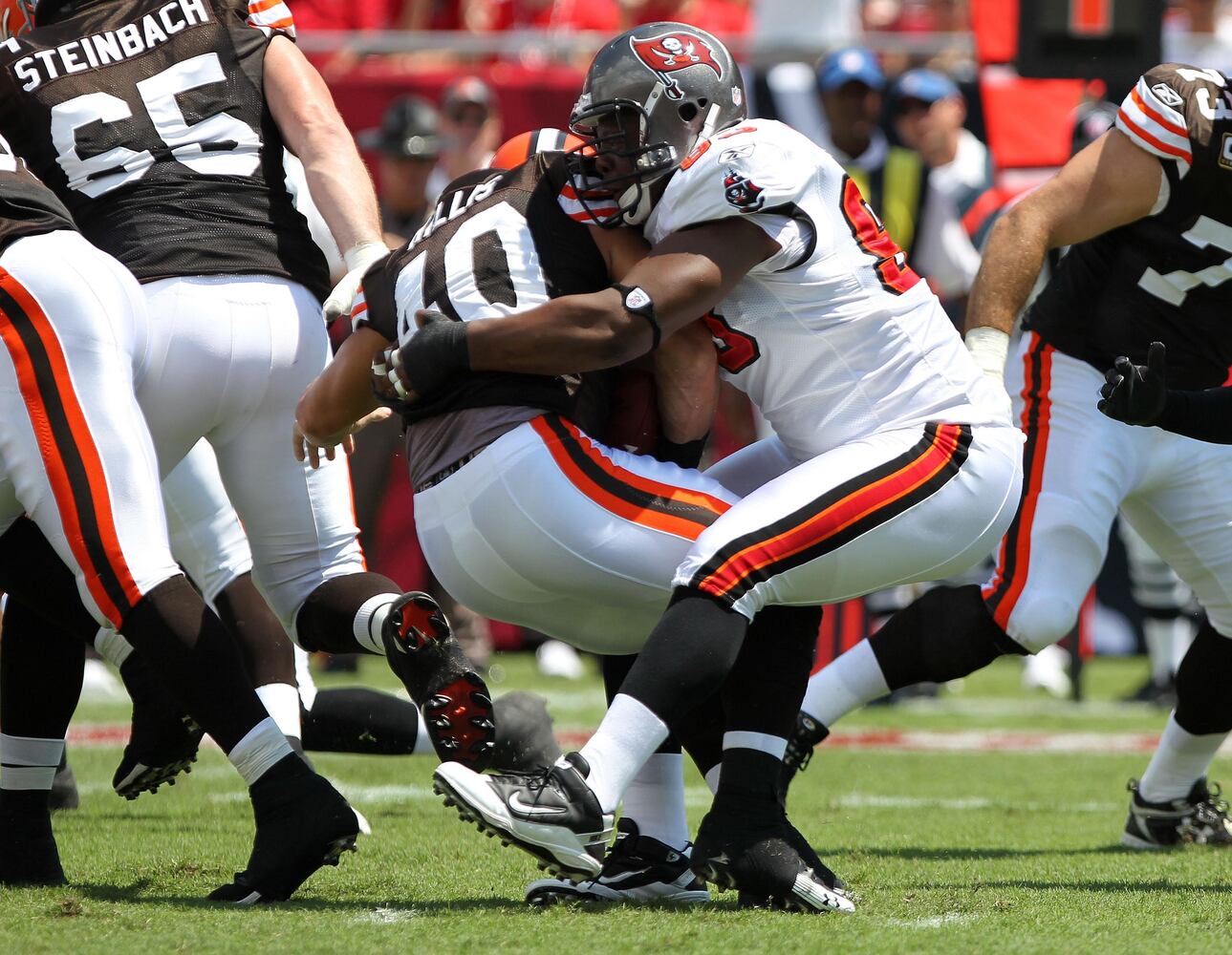 Buccaneers defensive tackle Gerald McCoy (93) tackles Cleveland Browns running back Peyton Hillis (40) during the first half.