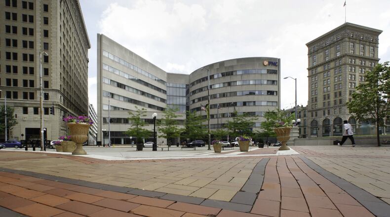 Business Furniture LLC, headquartered in Indianapolis, has signed a five-year lease for space on the ground floor of the PNC Building (center) at Third and Main streets. The company specializes in furnishings for business, government, healthcare, academic and science lab settings. CHRIS STEWART / STAFF