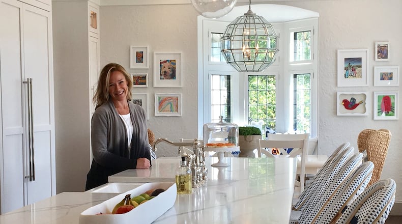 Alison Davis recently remodeled her kitchen in her Oakwood home on Ridgeway Road. Davis said she spent a year planning her kitchen renovation and was therefore able to avoid some of the trouble she ran into trying to quickly get through bathroom renovations in her house.