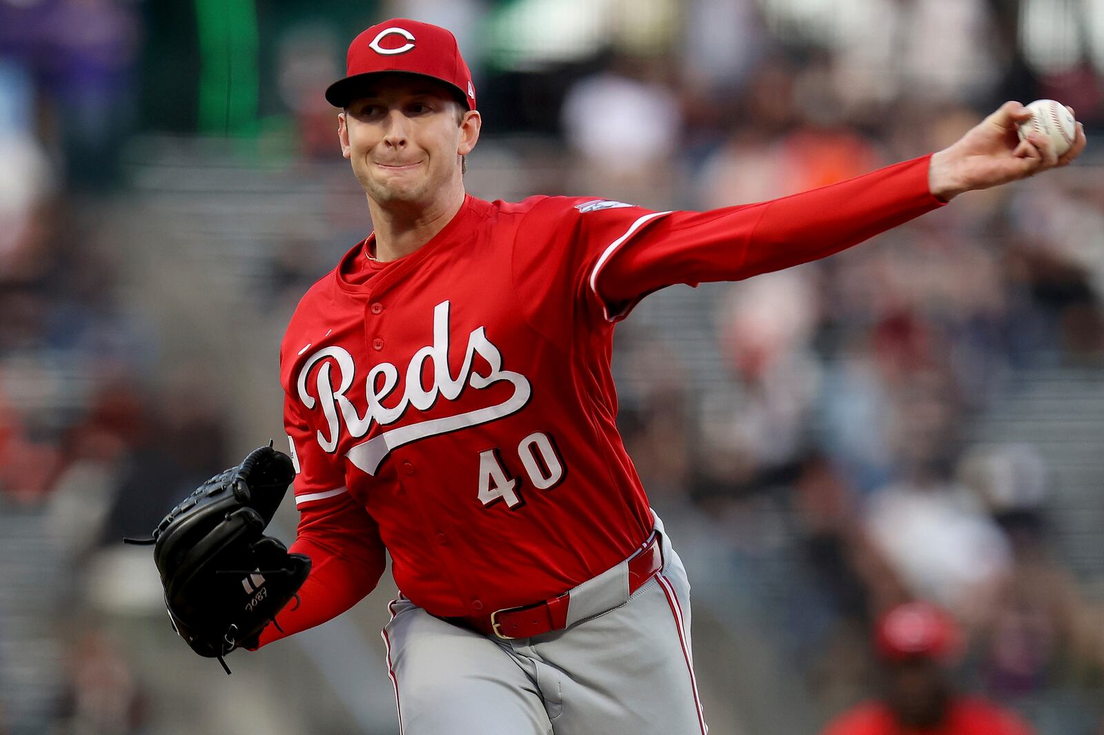 Cincinnati Reds' Nick Lodolo (40) throws a pitch in the first inning of a baseball game against the San Francisco Giants in San Francisco, Tuesday, April 8, 2025. (AP Photo/Scot Tucker)
