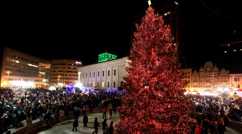The Dayton Holiday Festival committee is searching for the perfect tree to adorn Courthouse Square and be the centerpiece of the city’s holiday season. LISA POWELL / STAFF