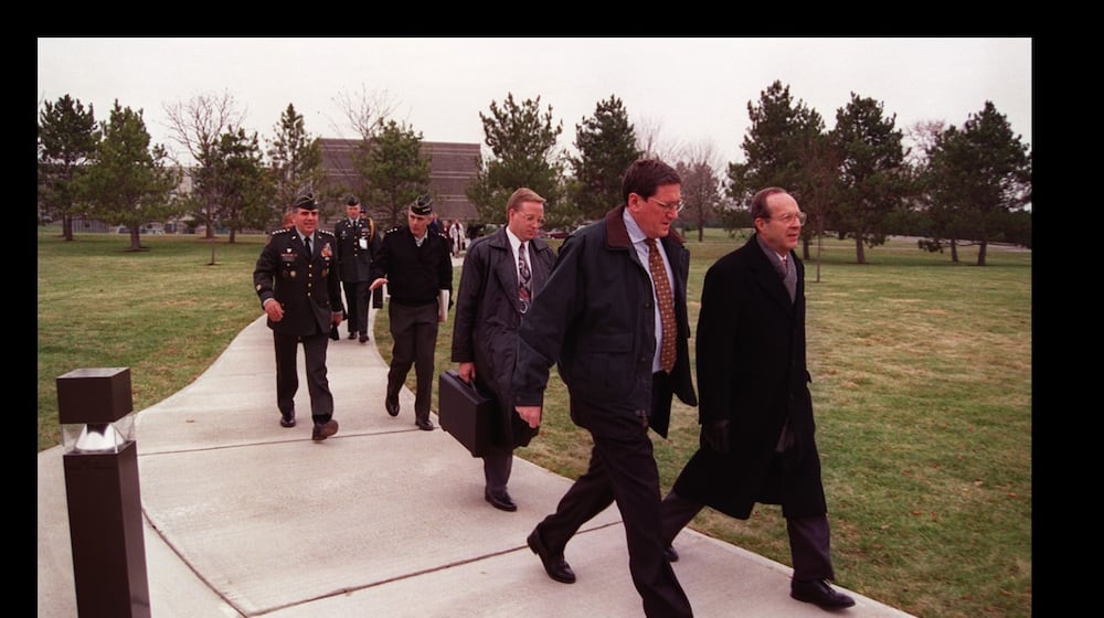 Thirty years ago, an agreement to end the Bosnian war was negotiated at Wright-Patterson Air Force Base. Here, Assistant Secretary of State Richard Holbrook and colleagues are walking on the "Peace Walk" on Wright-Patterson's Area A. Air Force photo.