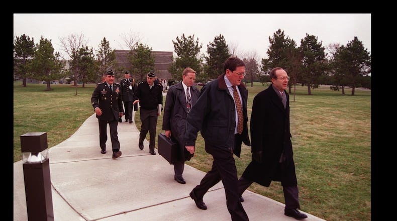 Thirty years ago, an agreement to end the Bosnian war was negotiated at Wright-Patterson Air Force Base. Here, Assistant Secretary of State Richard Holbrook and colleagues are walking on the "Peace Walk" on Wright-Patterson's Area A. Air Force photo.