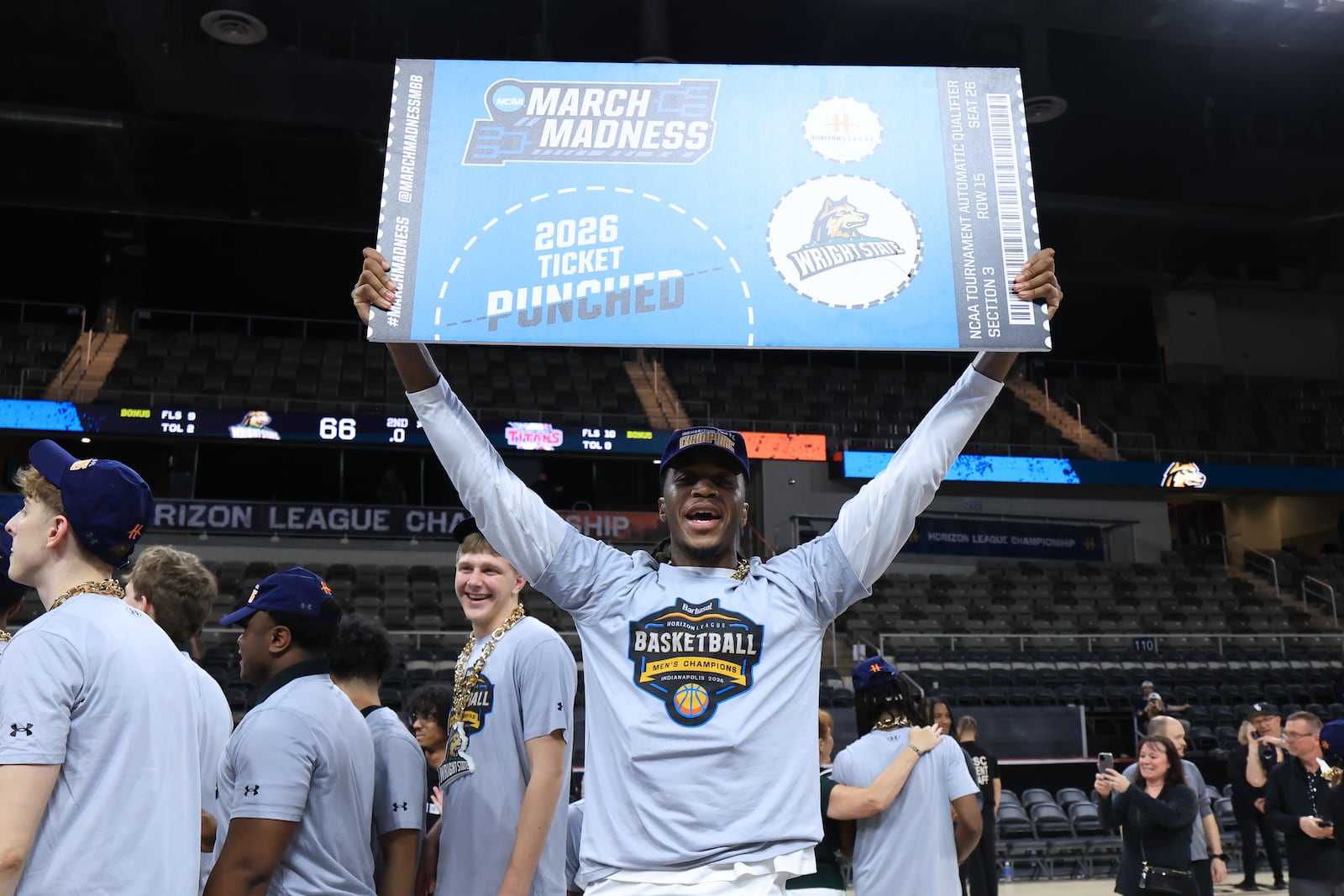 Wright State University's Bryan Etumnu holds up their March Madness ticket after their 66-63 victory over Detroit Mercy in the Horizon League tournament final on Tuesday, March 10, 2026 at Corteva Coliseum in Indianapolis. HORIZON LEAGUE / CONTRIBUTED PHOTO