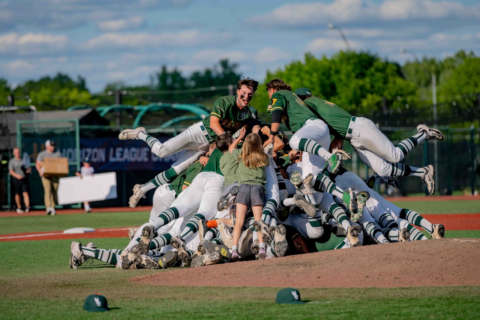 The Wright State University baseball team celebrates after beating Milwaukee to win the Horizon League tournament championship on May 25, 2025 at Nischwitz Stadium in Fairborn. WRIGHT STATE ATHLETICS / CONTRIBUTED PHOTO