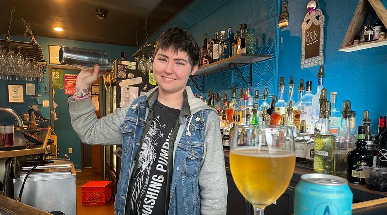 Lily’s Dayton in downtown Dayton offers a variety of non-alcoholic beverage options. Pictured is Katie Mae Venable, a bar manager at Lily’s Dayton.