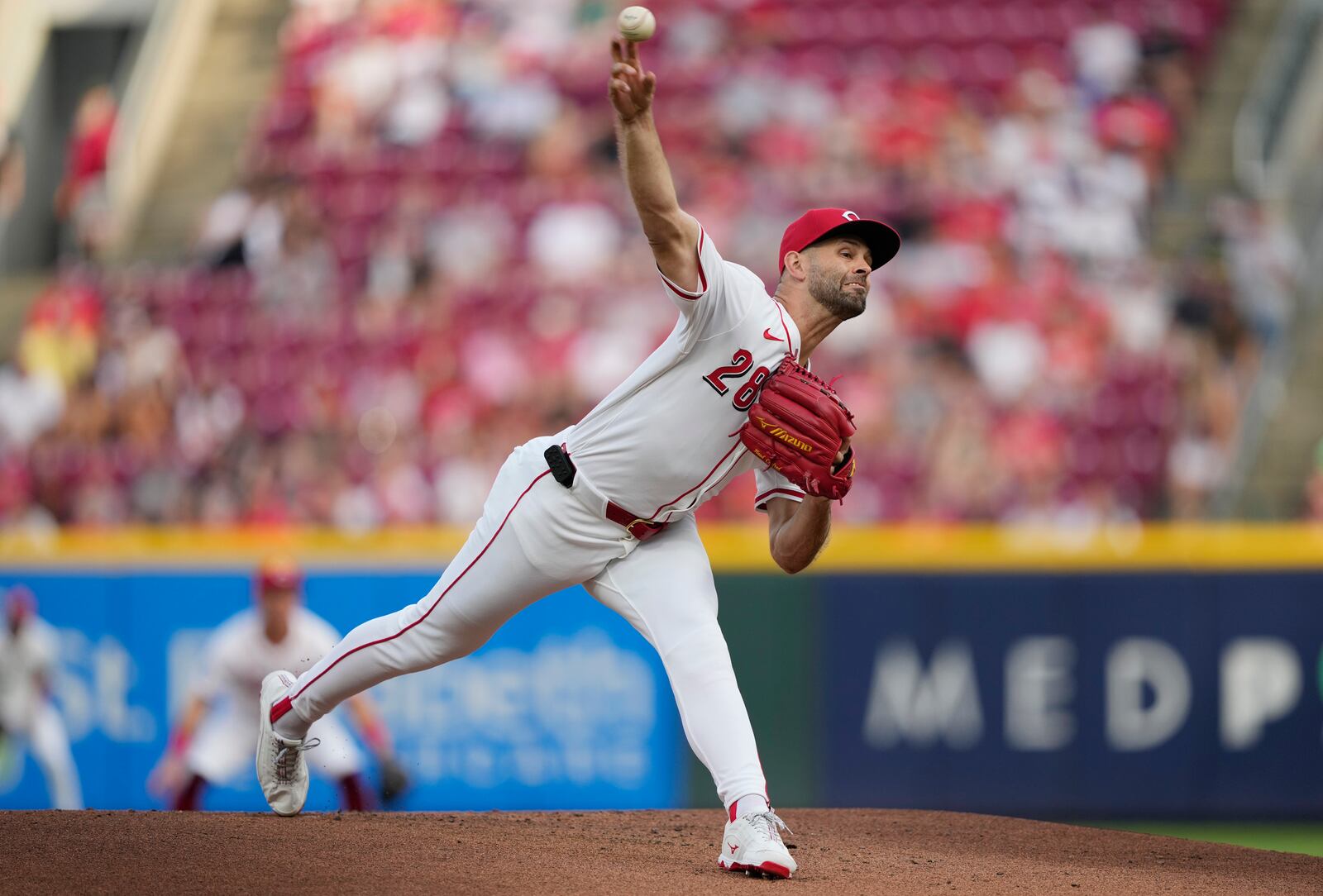 Cincinnati Reds pitcher Nick Martinez throws during the first inning of a baseball game against the Miami Marlins in Cincinnati, Tuesday, July 8, 2025. (AP Photo/Carolyn Kaster)