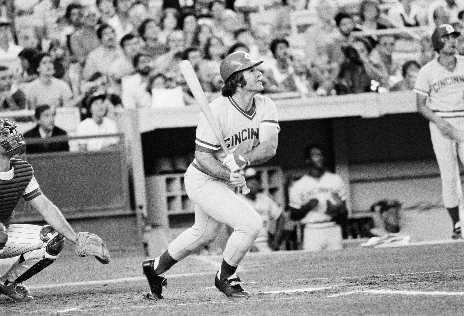 FILE - Cincinnati Reds' Pete Rose of the follows through after a long fly-out to the outfield during the first inning of a baseball game agains the New York Mets at New York's Shea Stadium, July 24, 1978. (AP Photo/G. Paul Burnett, File)