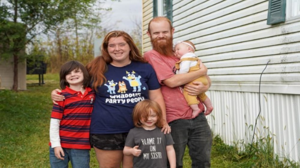 Nikki and Scott of Mechanicsburg with their family. CONTRIBUTED