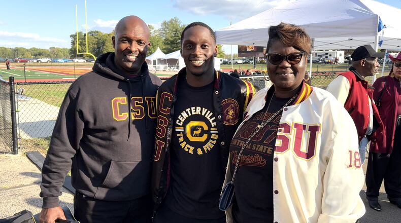 Central State receiver Corey Burnette Jr. – who caught an 11-yard touchdown pass in Saturday’s Homecoming game – with his parents Corey S. and Rochele, both of whom are CSU alums. Corey Sr. – now the assistant principal at Warner Middle School in Xenia and a former assistant football coach at Xenia High and Centerville High – was a member of the Marauders’ 1992 NAIA national championship team. Rochele is a mental health consultant who speaks nationally on the subject. TOM ARCHDEACON / CONTRIBUTED PHOTO