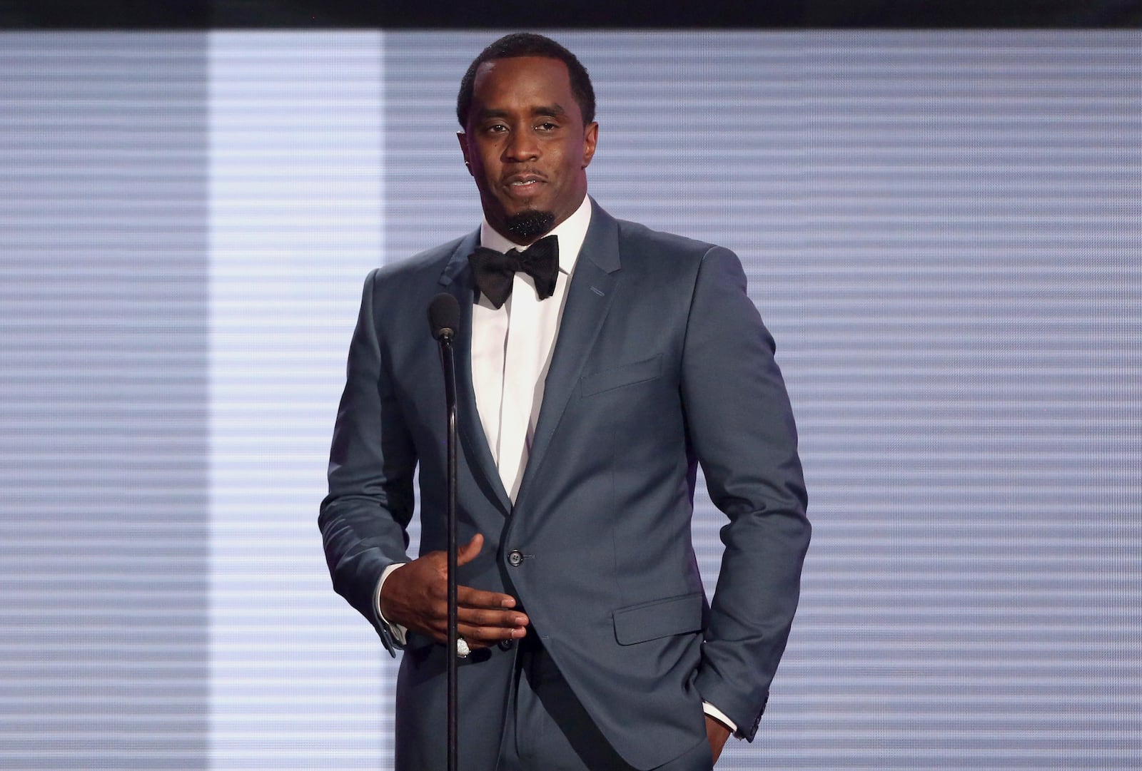 FILE - In this Nov. 22, 2015 file photo, Sean "Diddy" Combs presents the award for best collaboration of the year at the American Music Awards at the Microsoft Theater in Los Angeles. (Photo by Matt Sayles/Invision/AP, File)