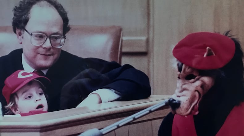 At the very first Big Bad Wolf Trial in 1989, Judge Dan Gehres and his three-year-old son Frank -- who had crawled up on his dad’s lap during the most gripping testimony – listen to the Big Bad Wolf (played by Gehres’ bailiff Chuck Taylor in a red cap and vest) give his account of the events. Today ,Frank Gehres will be sworn in as a Dayton Municipal Court Judge by his father, whose seat he is taking, Judge Dan Gehres retire Dec. 31. Chuck Taylor, who has been the bailiff and great friend of Dan Gehres for 36 years will now be the bailiff for Frank Gehres. CONTRIBUTED