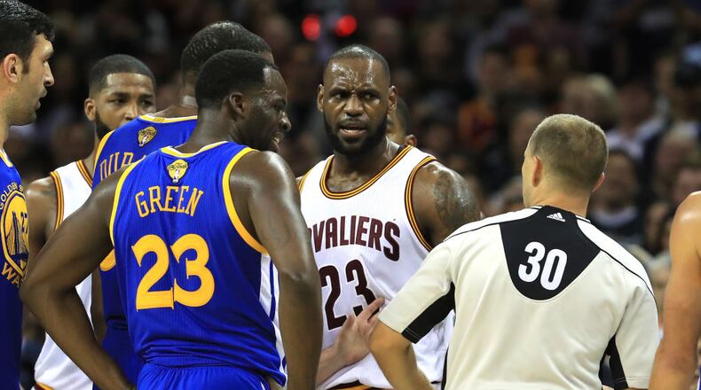 CLEVELAND, OH - JUNE 09:  LeBron James #23 of the Cleveland Cavaliers and Kevin Durant #35 of the Golden State Warriors speak after a foul in the third quarter in Game 4 of the 2017 NBA Finals at Quicken Loans Arena on June 9, 2017 in Cleveland, Ohio. NOTE TO USER: User expressly acknowledges and agrees that, by downloading and or using this photograph, User is consenting to the terms and conditions of the Getty Images License Agreement.  (Photo by Ronald Martinez/Getty Images)