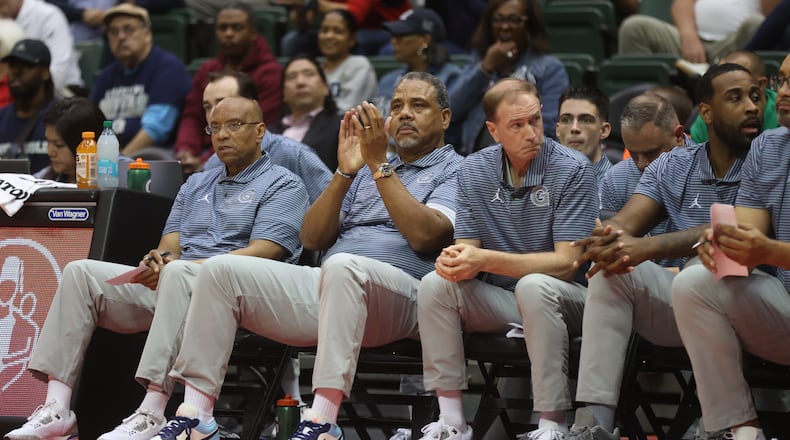 Georgetown's Ed Cooley, second from left, coaches during a game against Dayton on Thursday, Nov. 27, 2025, at the State Farm Field House in Kissimmee, Fla. David Jablonski/Staff