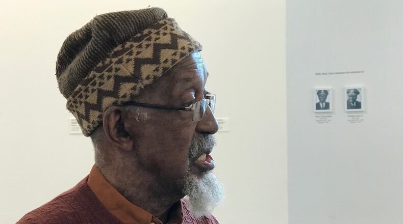 Internationally acclaimed Dayton artist Bing Davis -- once a high school and college basketball & track star -- talks about  his exhibit "Kneel" which ties together the silent protests of Colin Kaepernick and the murder of George Floyd. Tom Archdeacon/STAFF
