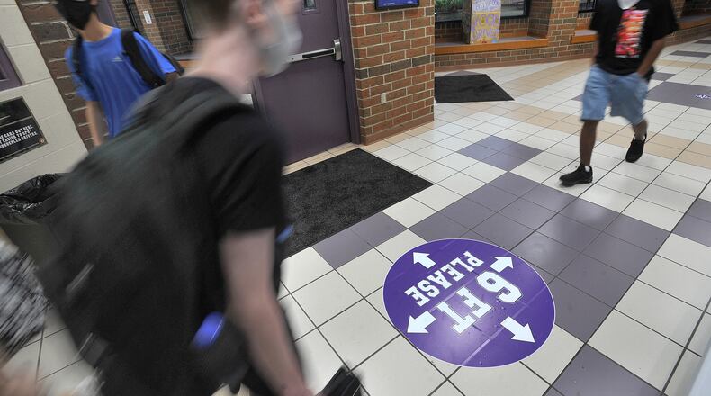 Bellbrook High School started it's second first day of classes Tuesday, Aug. 18. All students and staff were wearing masked and practicing social distancing. MARSHALL GORBY\STAFF