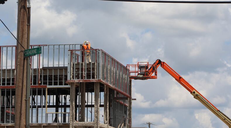 Dayton metro area has had weak job growth so far in 2019. But some industries, like construction, have had solid payroll growth. CORNELIUS FROLIK / STAFF