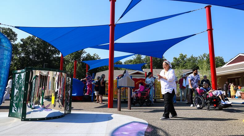 A ribbon cutting ceremony was held Friday, Aug. 8 for Stillwater Center's playground, named The Cove. The playground is designed to be an inclusive and accessible space for Stillwater Center residents of all ages and abilities. BRYANT BILLING / STAFF
