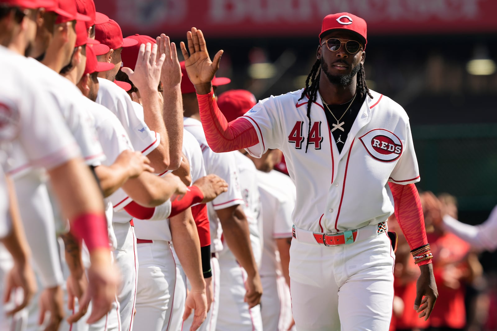 Cincinnati Reds shortstop Elly de la Cruz (44) is introduced before an opening-day baseball game between the Cincinnati Reds and the Boston Red Sox in Cincinnati, Thursday, March 26, 2026. (AP Photo/Carolyn Kaster)