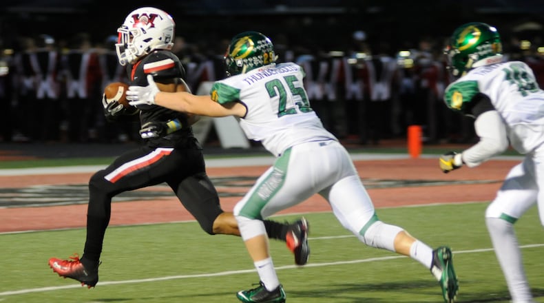 Wayne’s Steve Victoria (left) is pursued by Aidan Reaman of Northmont. Wayne defeated visiting Northmont 49-20 in a Week 5 high school football game on Friday, Sept. 21, 2018. MARC PENDLETON / STAFF