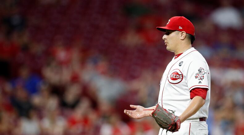 CINCINNATI, OH - JULY 01: David Hernandez #37 of the Cincinnati Reds reacts after walking in the go ahead run for the Milwaukee Brewers in the seventh inning at Great American Ball Park on July 1, 2019 in Cincinnati, Ohio. The Brewers won 8-6. (Photo by Joe Robbins/Getty Images)