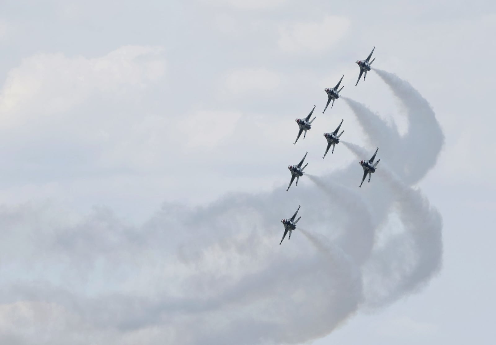 Tipp City police officer Jordan Little was honored by the United States Air Force Thunderbirds as a "Hometown Hero" and flew as a VIP in the back seat of an F-16 piloted by Maj. Brandon Maxson during a practice performance before the CenterPoint Energy Dayton Air Show Friday, June 20, 2025, in Vandalia. Little was recognized for his life-saving efforts of Justin Trevino, who was also in attendance. NICK GRAHAM/STAFF