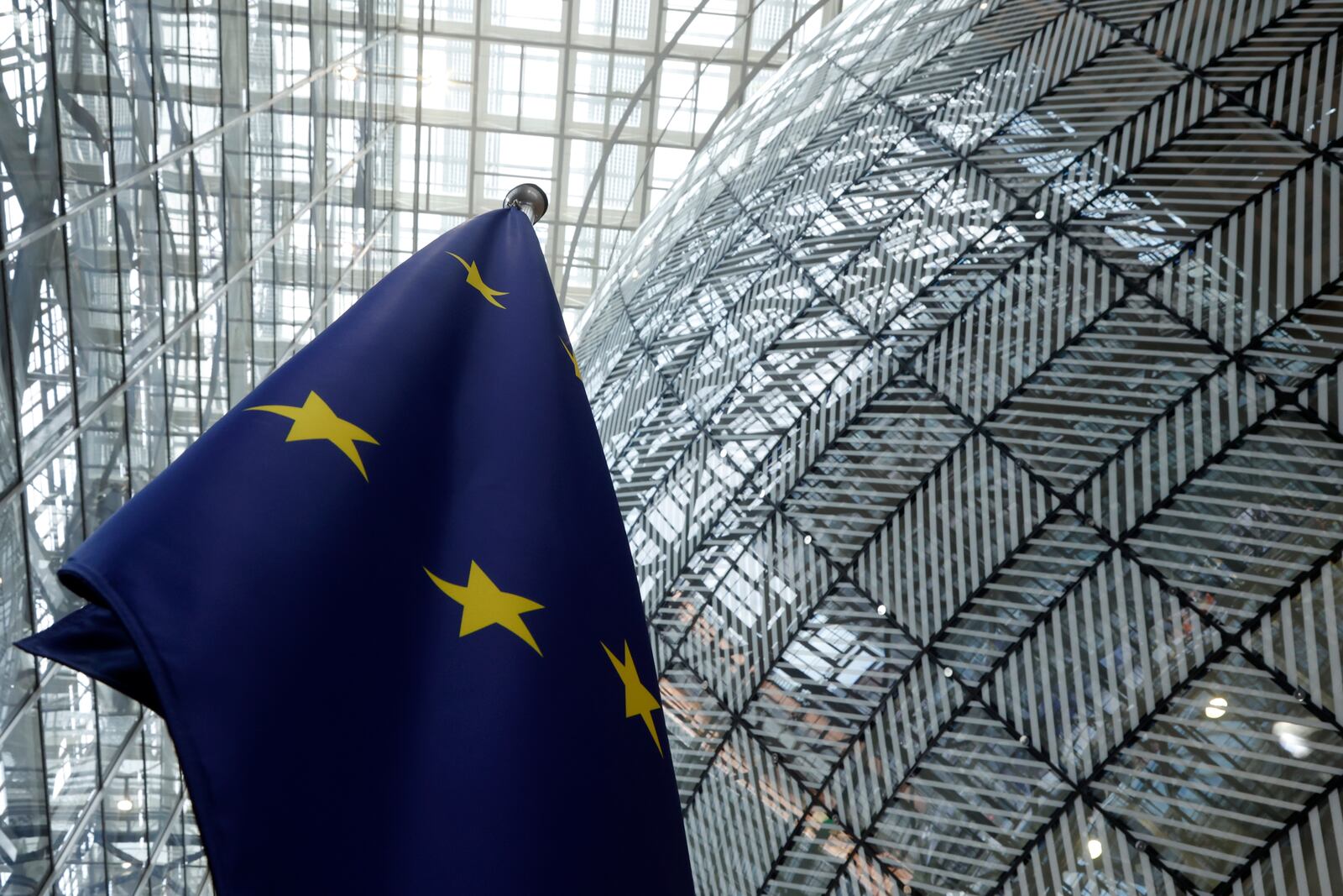 FILE - The European Union flag stands inside the atrium at the European Council building in Brussels on June 17, 2024. (AP Photo/Omar Havana, File)