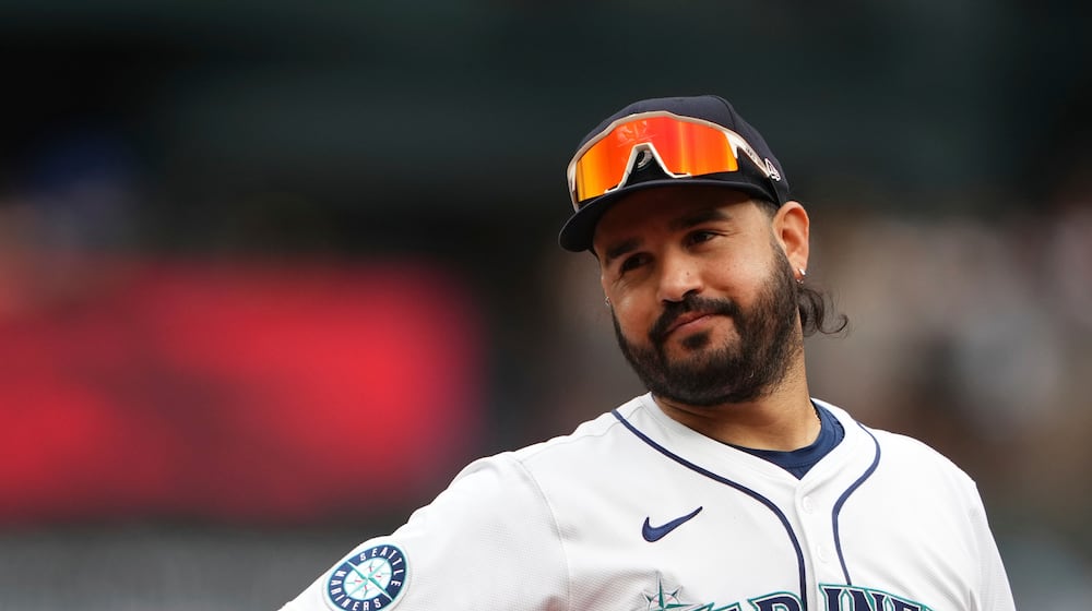FILE - Seattle Mariners third baseman Eugenio Suarez looks on during a baseball game against the San Diego Padres, Aug. 27, 2025, in Seattle. (AP Photo/Lindsey Wasson, File)