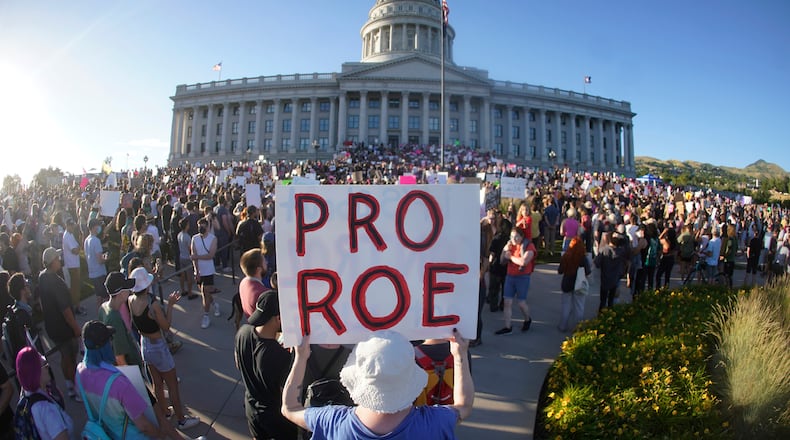 FILE - People attend an abortion-rights rally at the Utah State Capitol in Salt Lake City after the U.S. Supreme Court overturned Roe v. Wade, June 24, 2022. (AP Photo/Rick Bowmer, File)