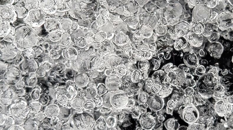 A close up detail photo of sleet as wintry mix covered the Butler County area Thursday, Feb. 3, 2022 with more ice and snow expected to fall. NICK GRAHAM/STAFF