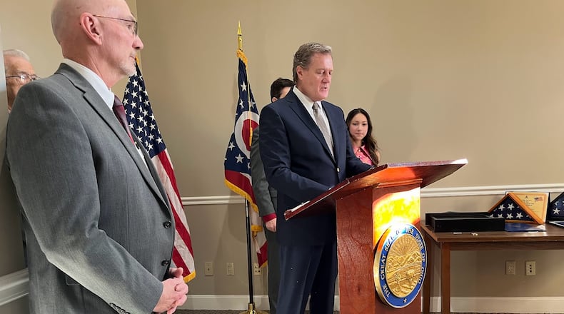 U.S. Rep. Mike Turner introduces four citizens to be thanked for services to their communities Wednesday at his downtown Dayton office. THOMAS GNAU/STAFF