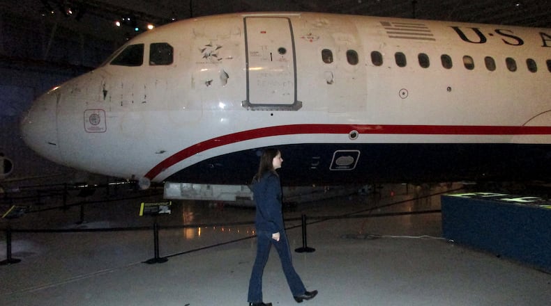The roped-off Airbus A320 sits low to the ground so that the jet's tall tail can fit inside the museum's dimly lit hangar. (John Bordsen/Chicago Tribune/TNS)