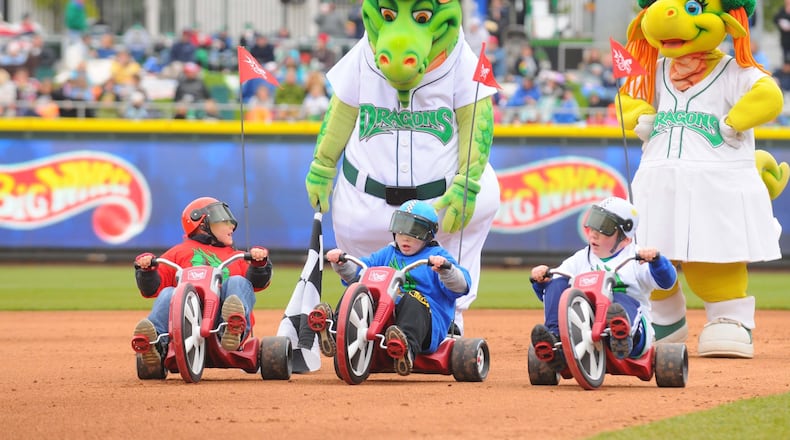 That’s how they roll: Heater and Gem with some young Dragons fans. CONTRIBUTED/FILE